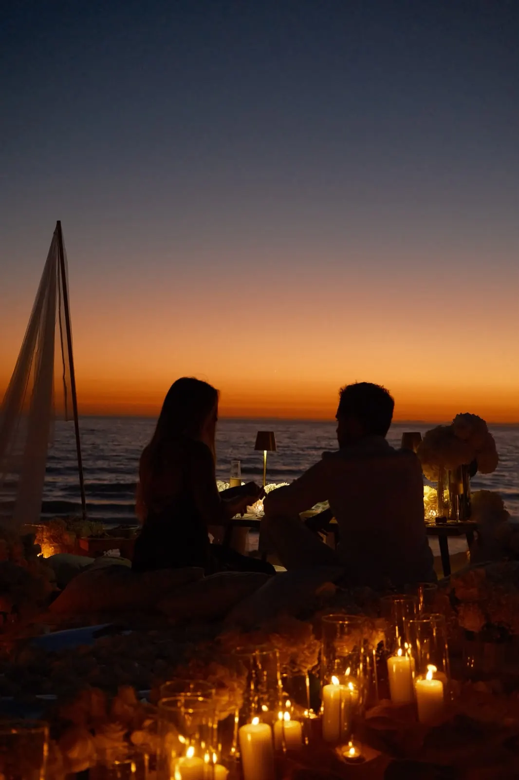 The couple by candlelight after sunset